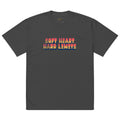 Black t-shirt with colorful text 'SOFT HEART HARD LIMITS' on a white background