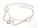 Silver collar with heart charm on a white background