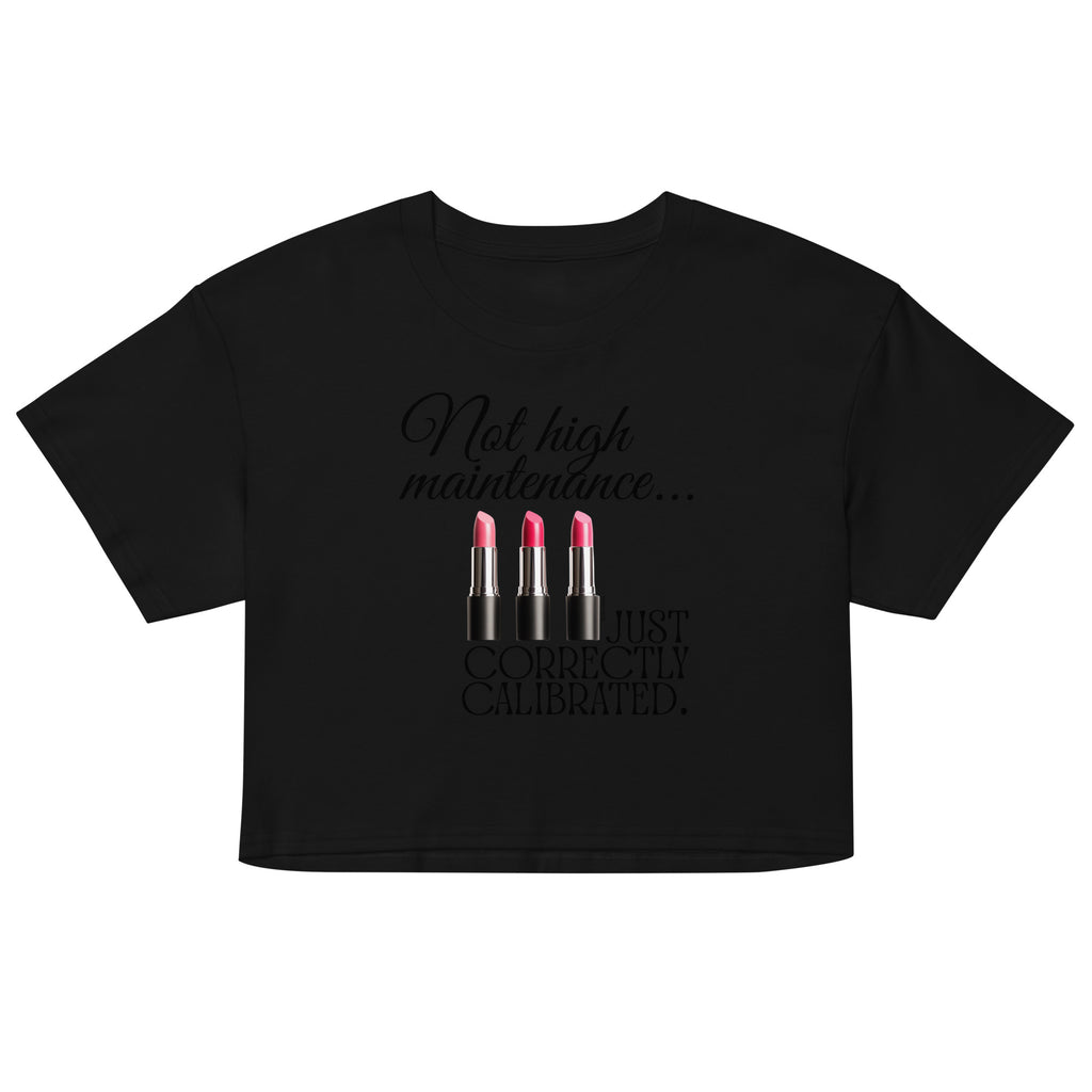 Black crop top with lipstick graphic and text on a white background
