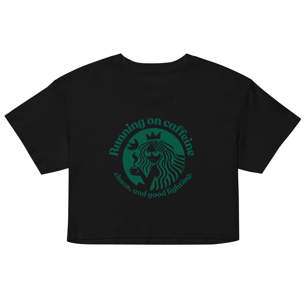 Black crop top with green graphic and text on a white background