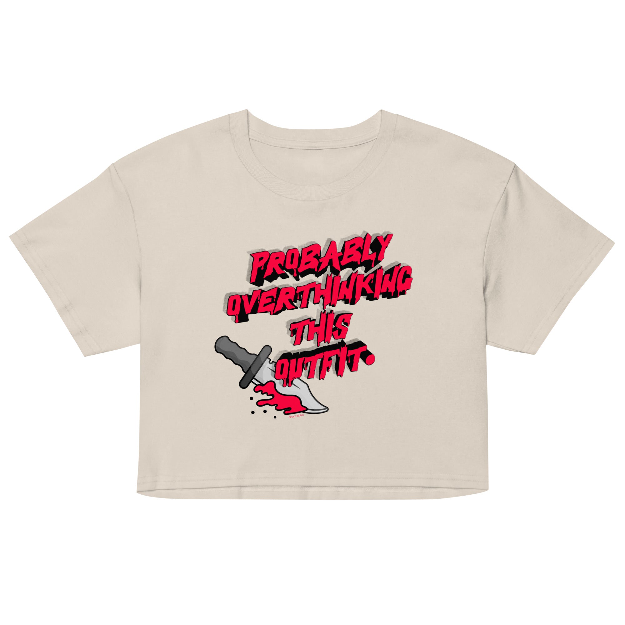 Beige crop top with red and black graphic design on a white background