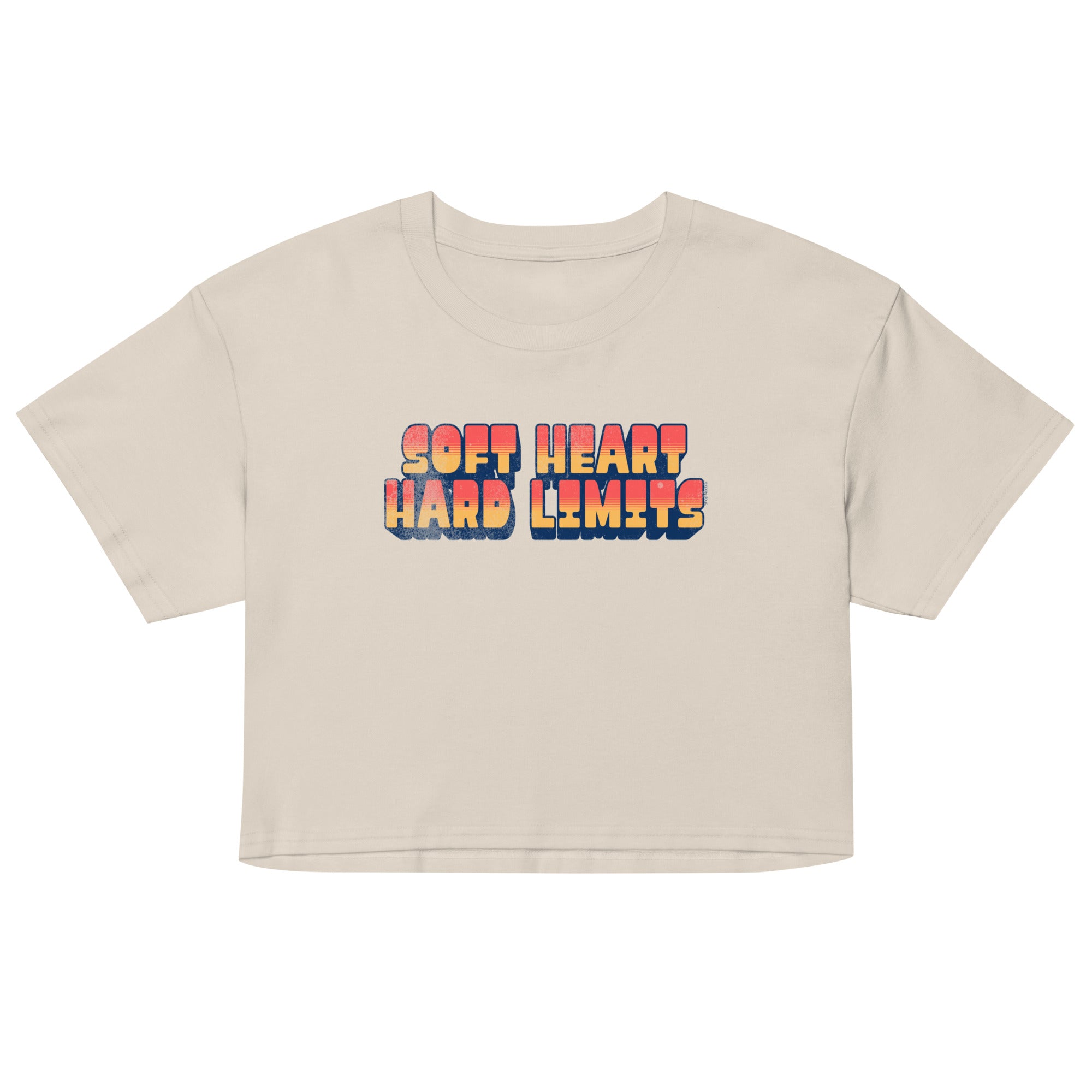 Beige crop top with 'Soft Heart Hard Limits' text on a white background