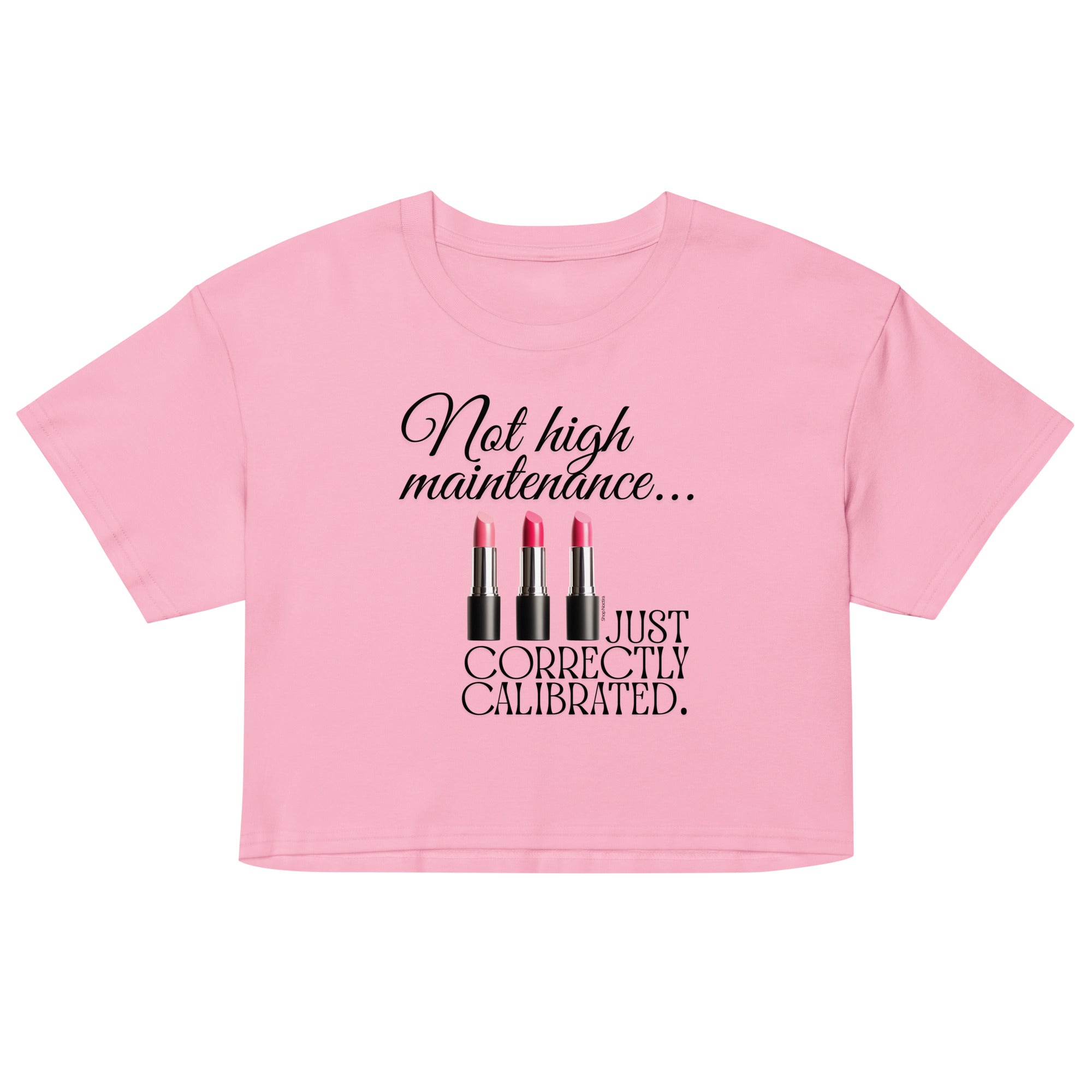 Pink crop top with black text and lipstick graphics on a white background
