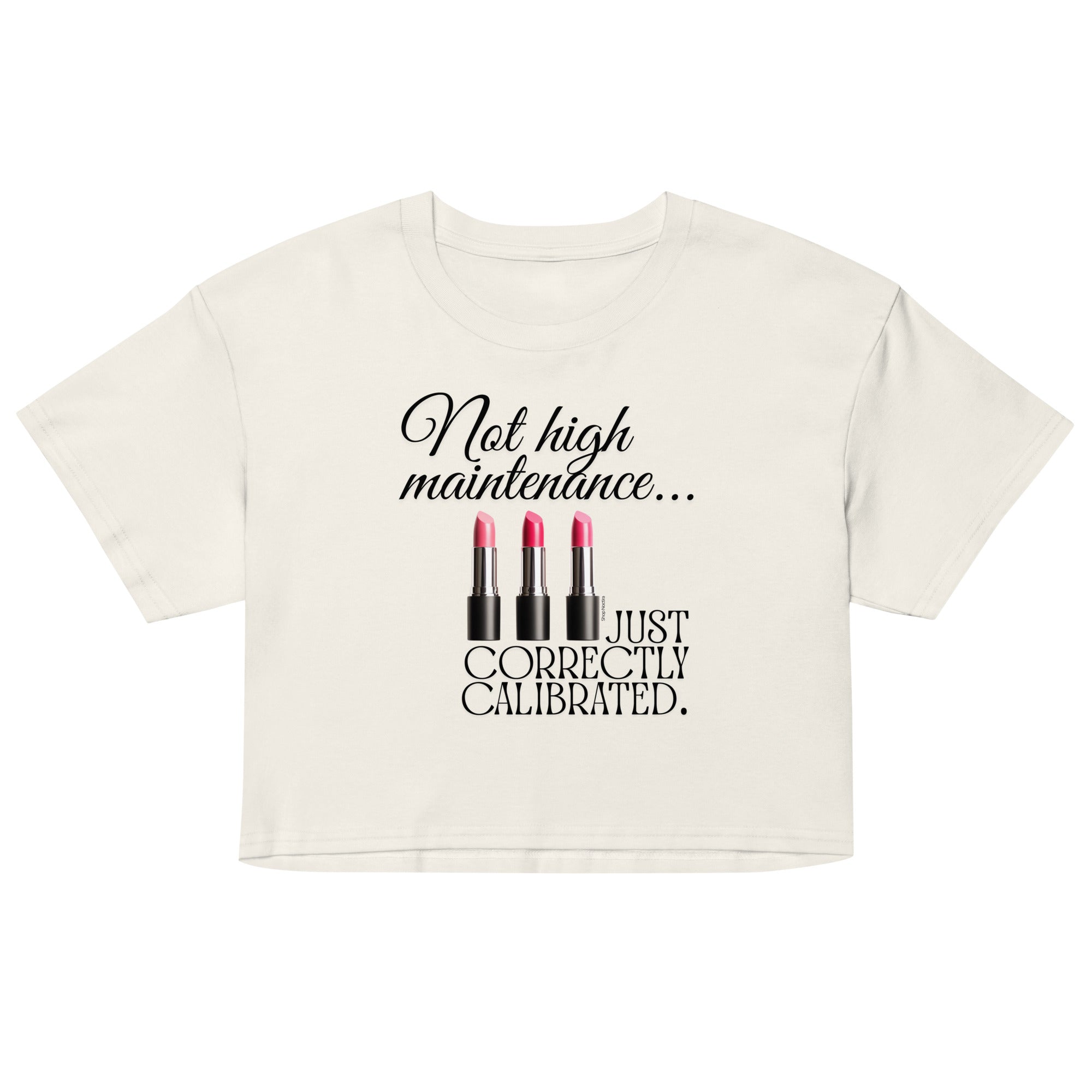 White crop top with black text and lipstick graphics on a white background