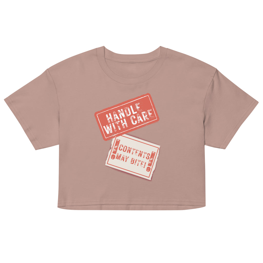 Brown crop top with 'Handle with Care' and 'Contents May Vary' text on a white background