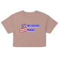 Beige crop top with graphic design and text on a white background