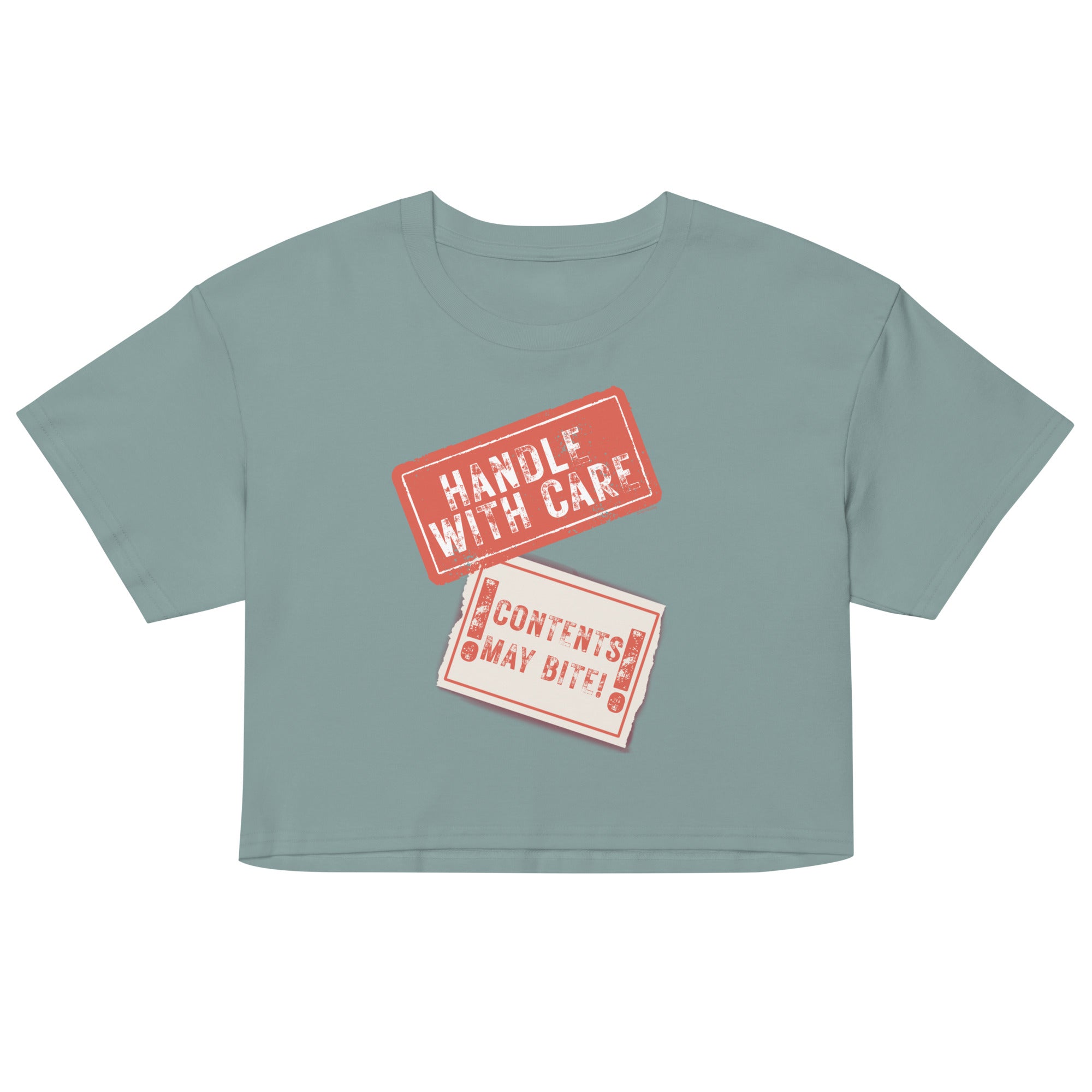 Light blue crop top with 'Handle with Care' and 'Contents May Vary' text on a white background