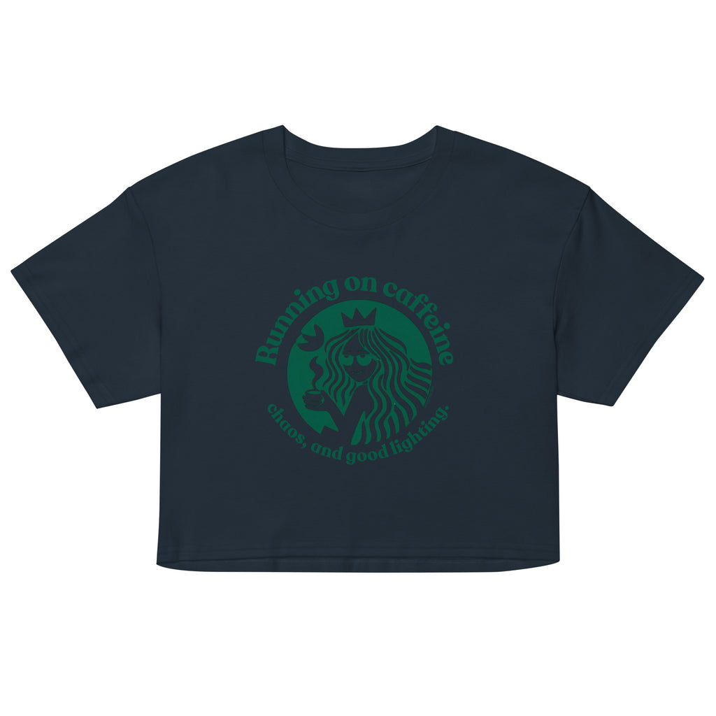 Black crop top with green graphic and text on a white background