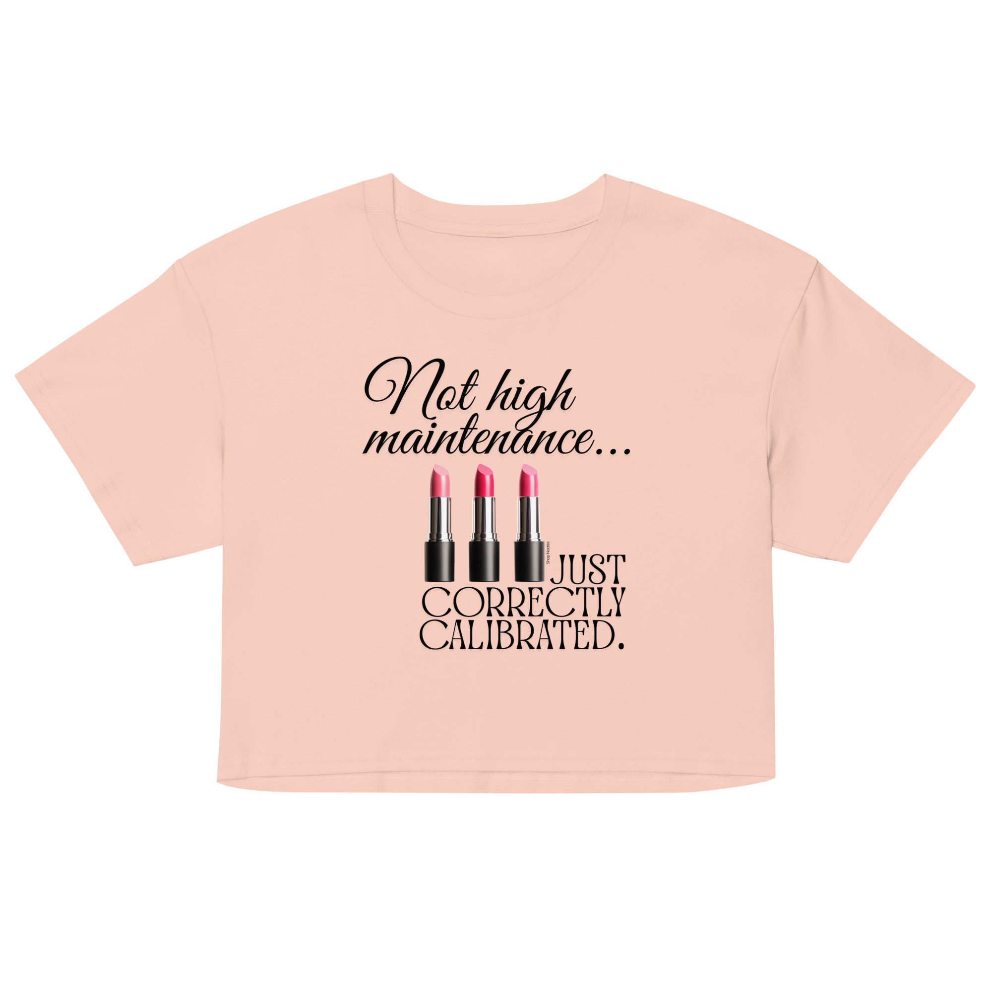 Pink crop top with text and lipstick graphics on a white background