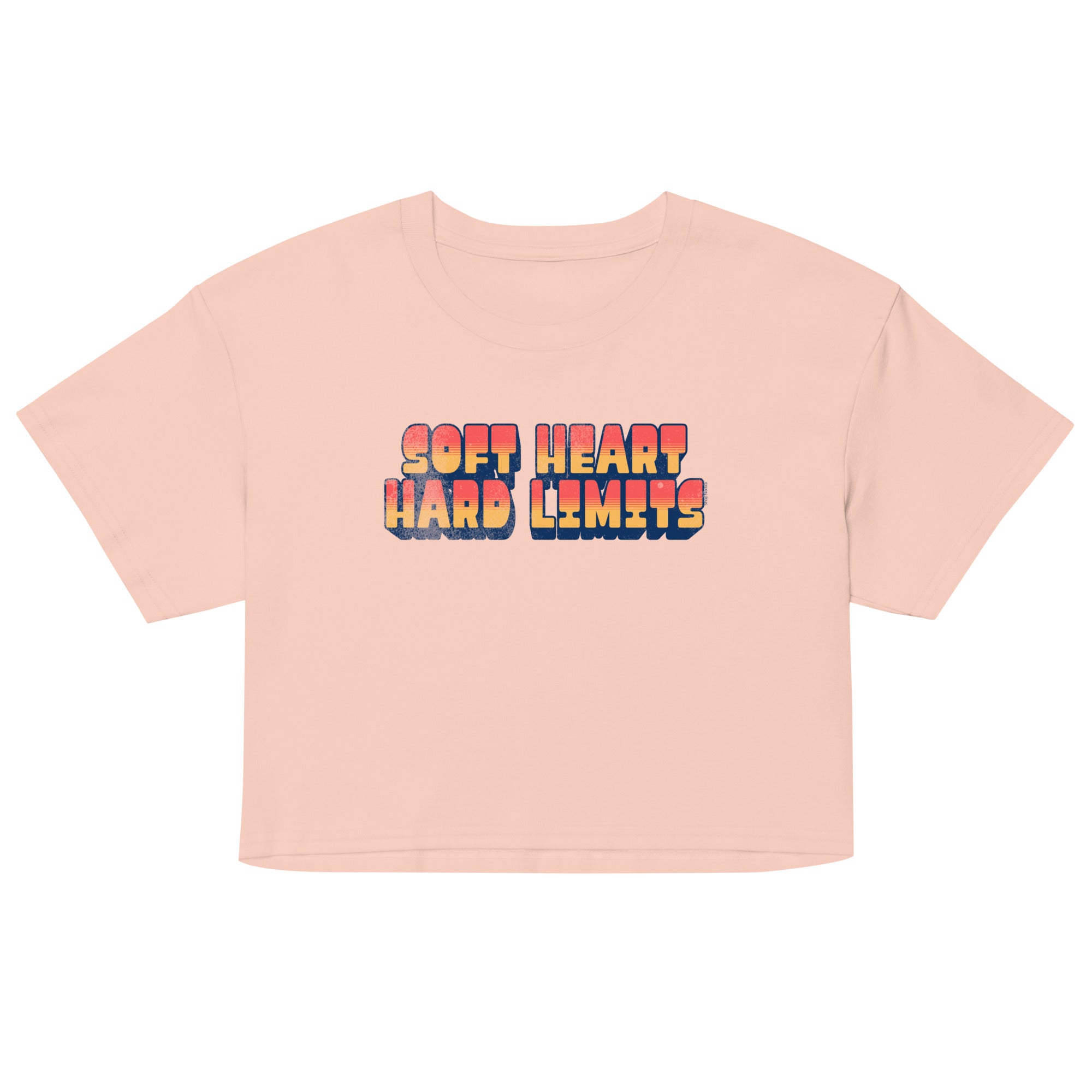 Pink crop top with 'Soft Heart Hard Limits' text on a white background