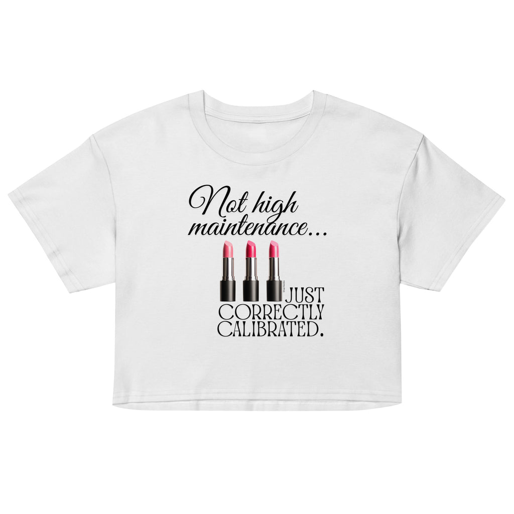 White crop top with black text and lipstick graphics on a white background