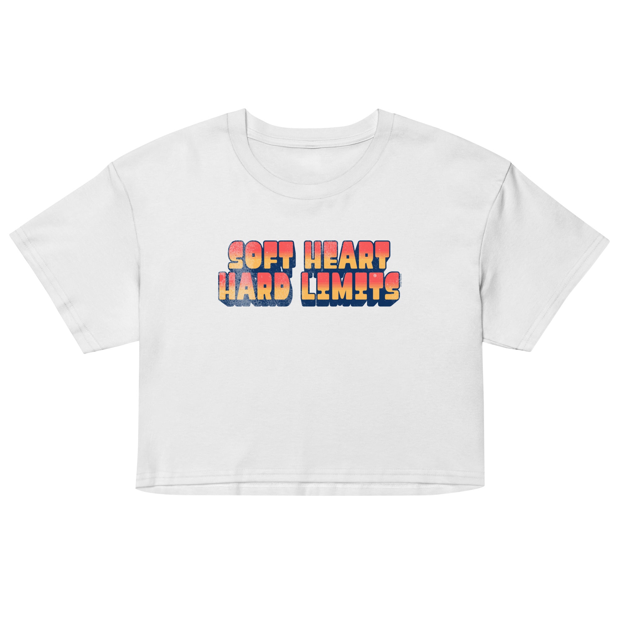 White crop top with colorful text 'SOFT HEART HARD LIMITS' on a white background