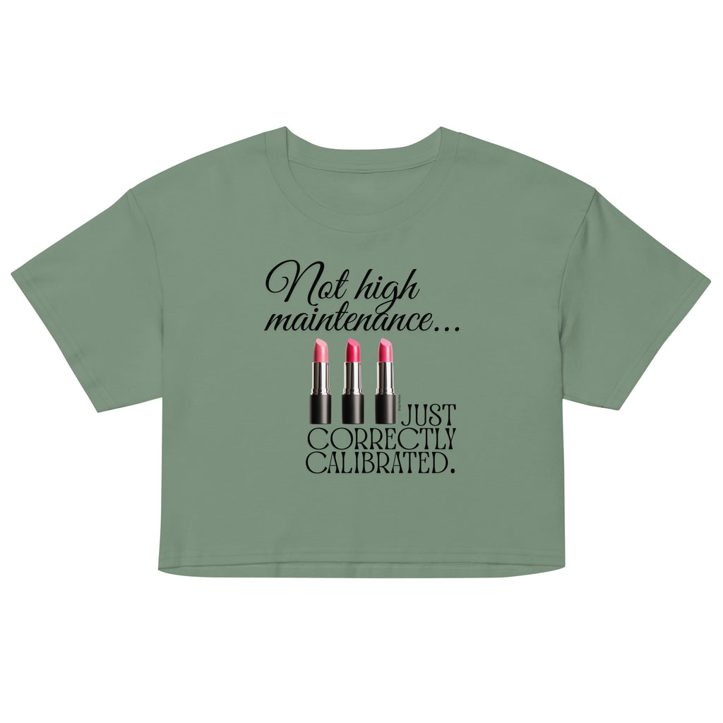 Green crop top with text and lipstick graphics on a white background