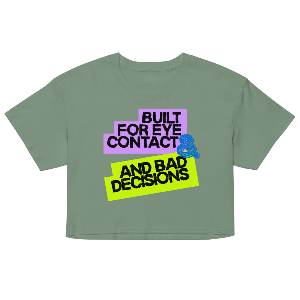 Green crop top with colorful text and graphic on a white background