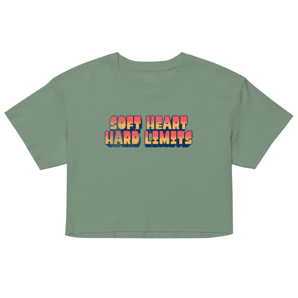 Green crop top with 'Soft Heart Hard Limits' text on a white background