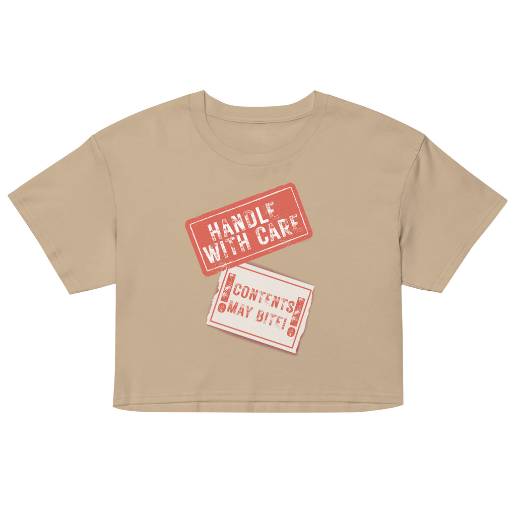 Beige crop top with red and white graphic text on a white background