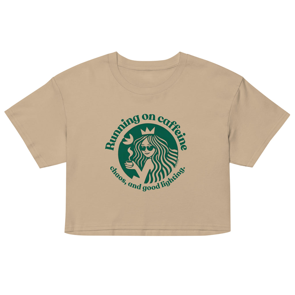 Beige crop top with green graphic and text on a white background